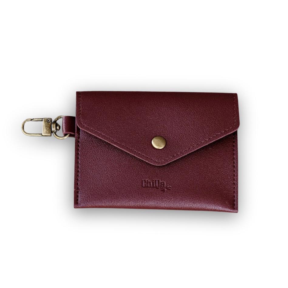 A small crimson pouch
