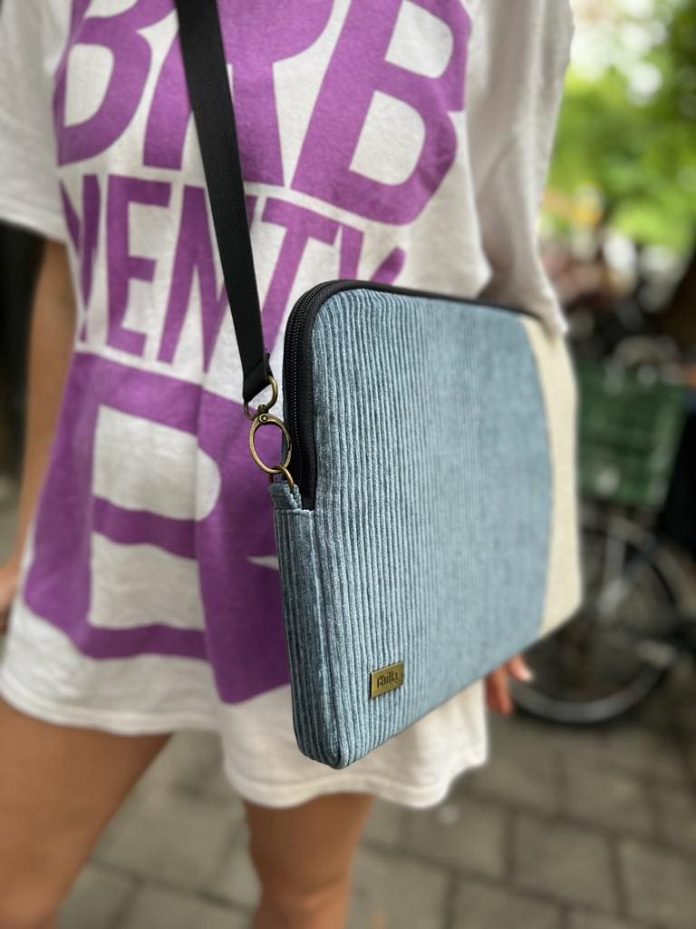 Turquoise laptop case with shoulder strap