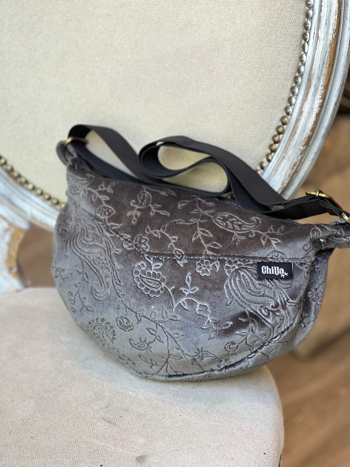 Side bag with velvet embellishments