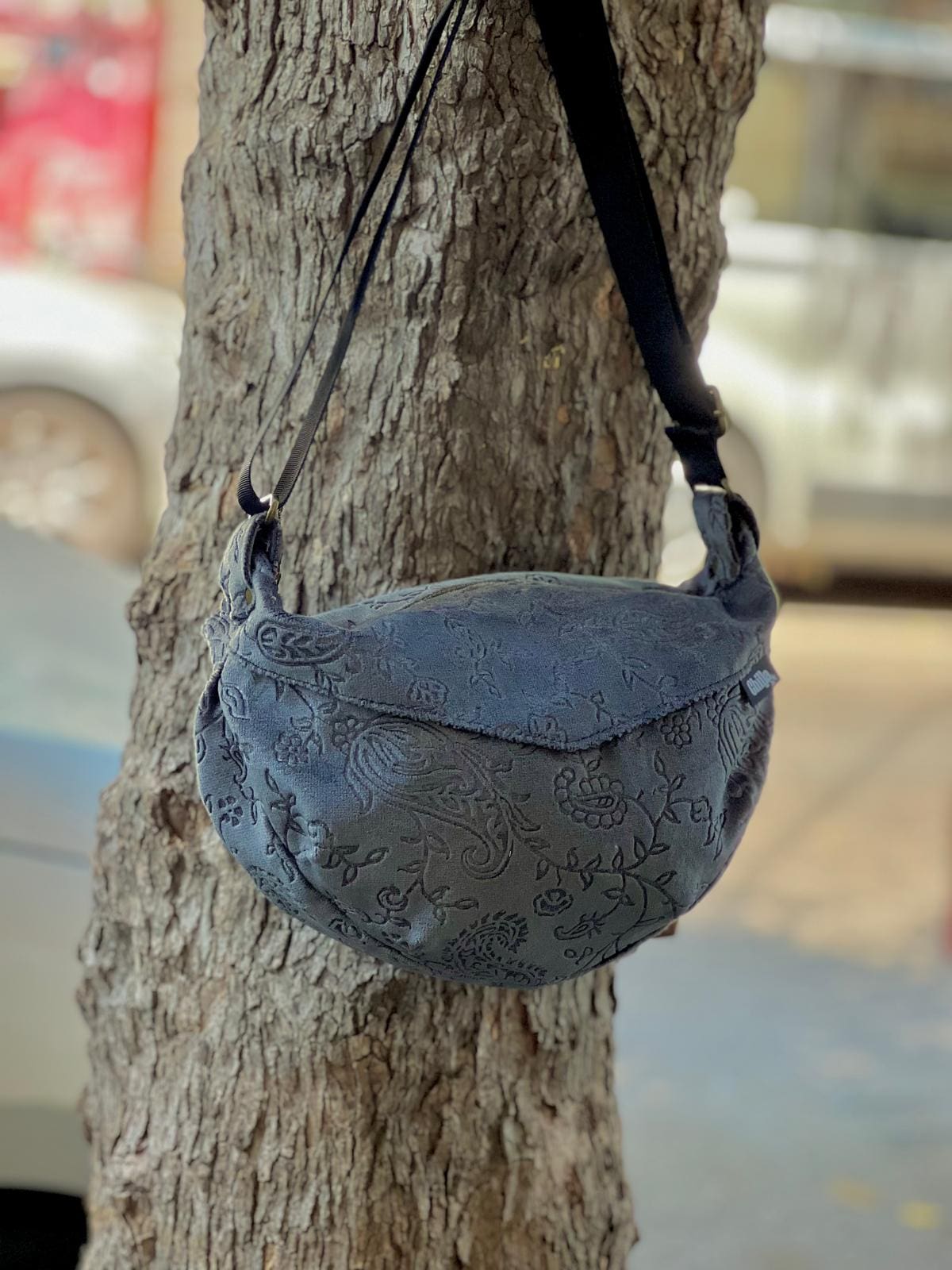 Side bag with velvet embellishments