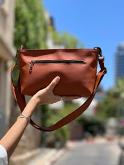 תיק צד/ קלאץ' רחל כתום חמרה