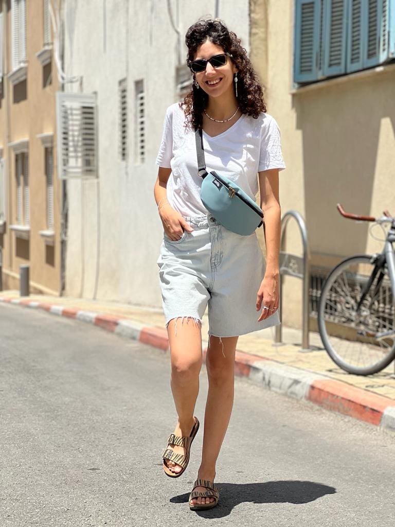 פאוץ' הלגה תכלת דמוי עור