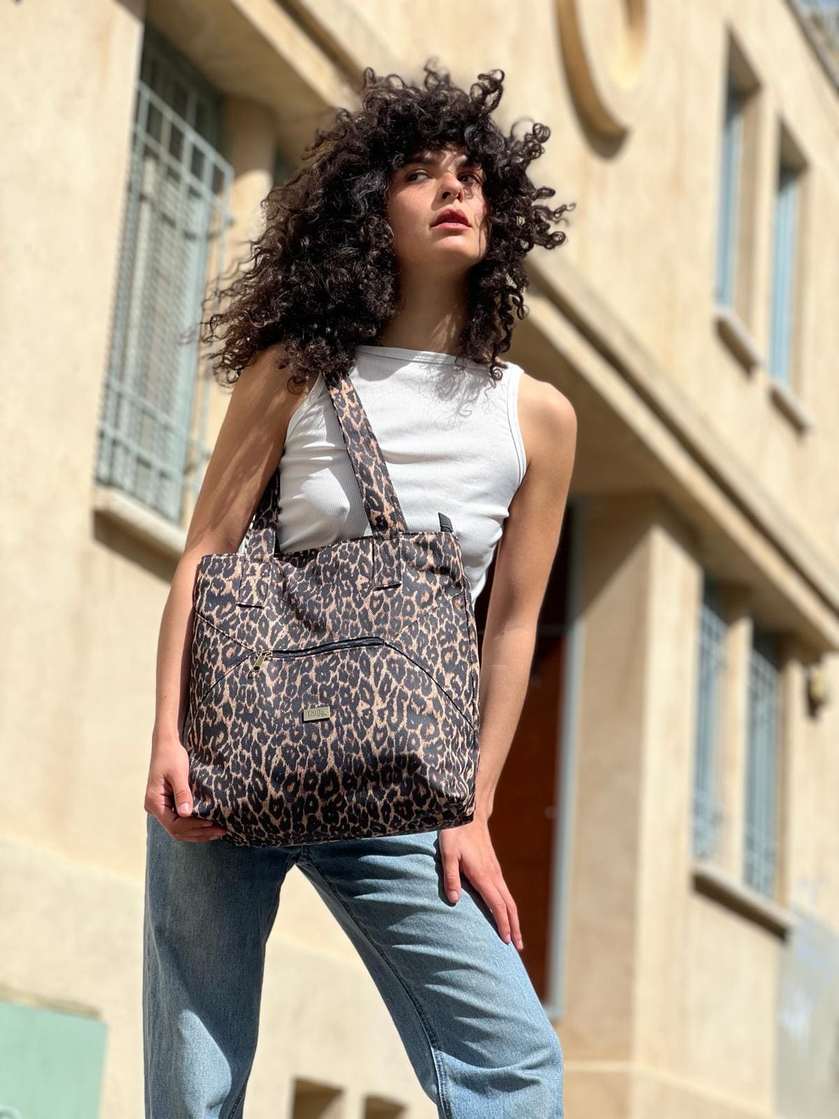 תיק צד Tommy מנומר חדש