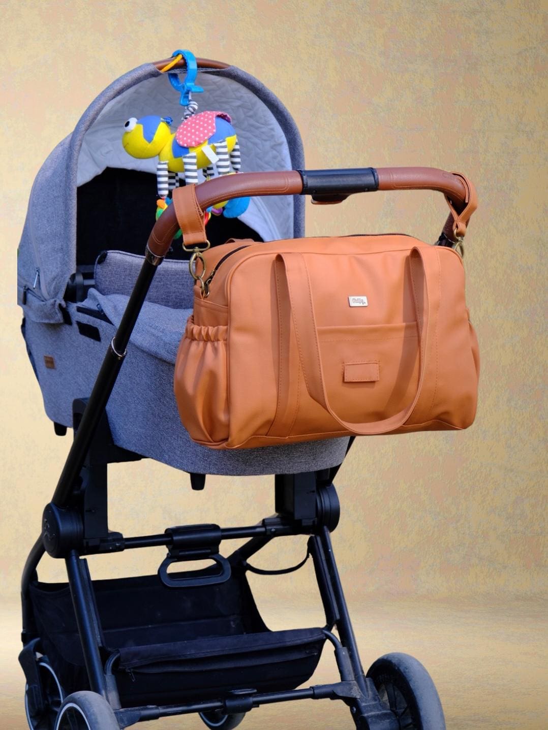 תיק החתלה Ita כתום חמרה